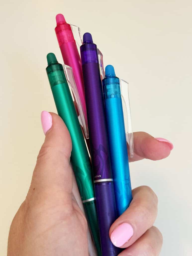 women holding erasable pens which are great for sewing